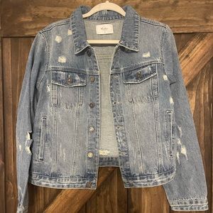 Distressed denim jacket